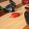 black-hungarian-peppers-on-cutting-board