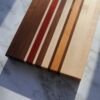 Edge grain cutting board made from walnut, maple, cherry, and padauk