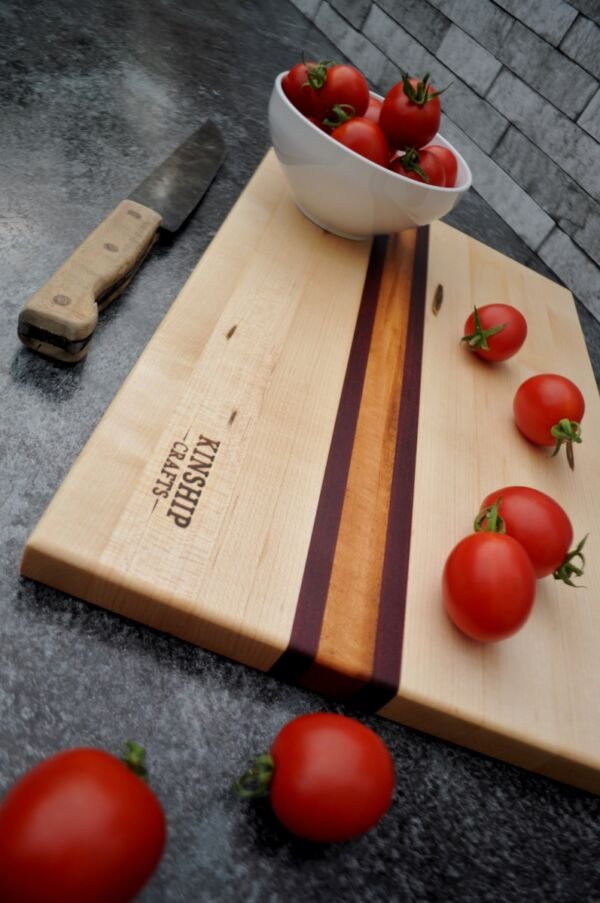 cutting board by kinship crafts: maple, purple heart, tiger wood